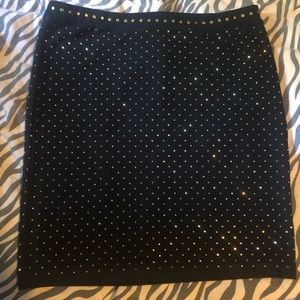 Mini skirt with shiny gold beads.